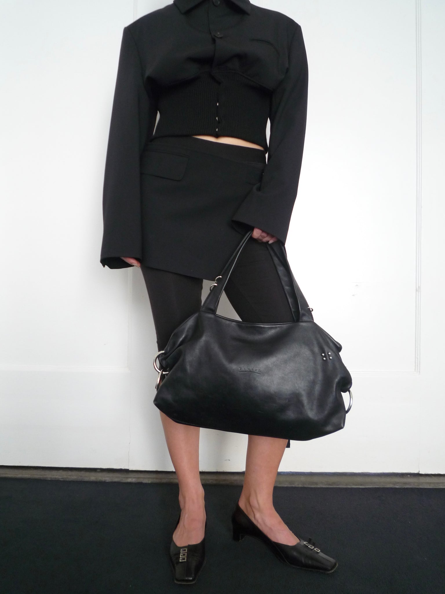 Black Leather Piercing Bag